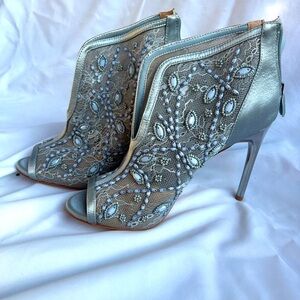 Peep tow lace with sequins dress booties in size 9.